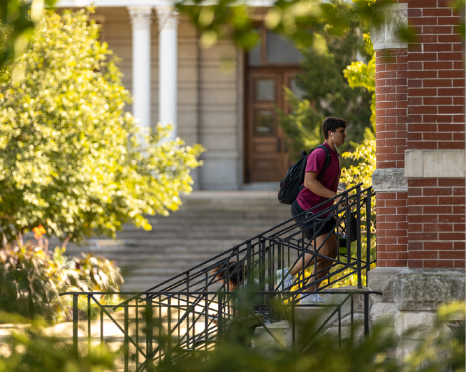 Student walking on campus.